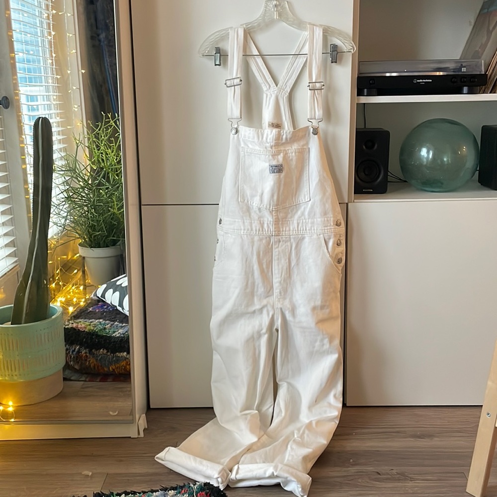 White Levi’s overalls